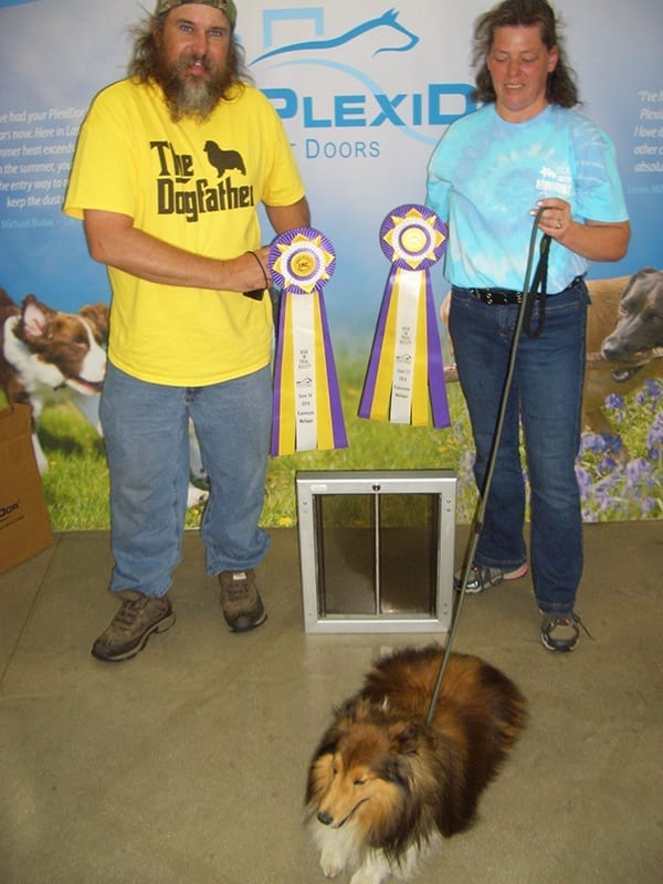 Here is Toby with his owners, Kim Charles and Bruce Winter. 
